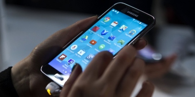 „Samsung“ labai daug tiksi iš „Galaxy S5“ ir Pasaulio futbolo čempionato