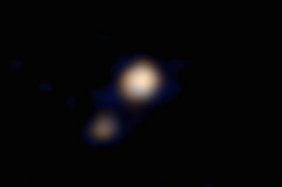 Paviešinta pirmoji NASA „New Horizons“ spalvota Plutono nuotrauka