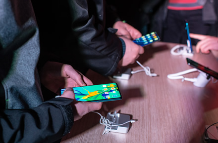 Hundreds of fans have gathered to evaluate and buy the latest Huawei phones